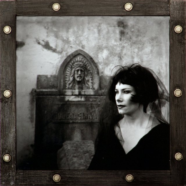 Rain in Spain III (Unveiled).jpg - “Rain in Spain III”   18 x 18 x 3”   Holga Photograph, Mixed Media on Wood Porthole Box Frame w/ Metal Bolts and Plexiglass 2007  