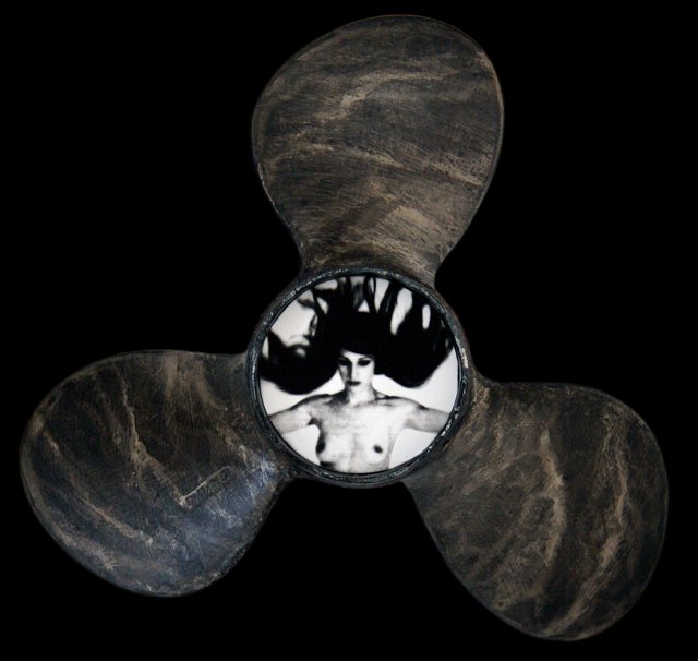 Propeller-II.jpg - "Propeller II" 10 x 10 x 5" inches�� Mixed Media on Aluminum Propeller, Photograph Photograph Developed by Jennifer Hart Biagiotti  2008