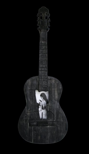 Beauty and a Broken Song III.JPG - “Beauty and a Broken Song III”   15 x 40 x 4”    Mixed Media on Burnt Guitar, Photograph     Photograph Developed by Jennifer Hart Biagiotti 2008  